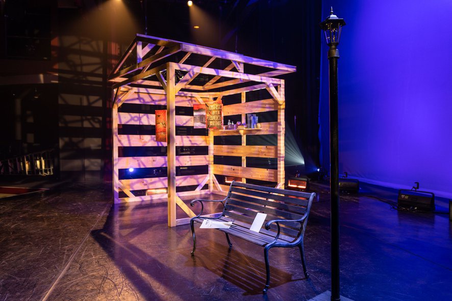 Wood structure with hanging paintings in the inter