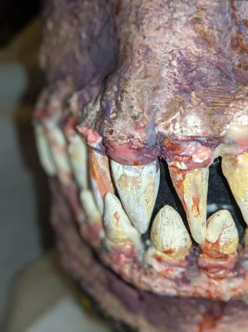 Detail of mask with prosthetic teeth