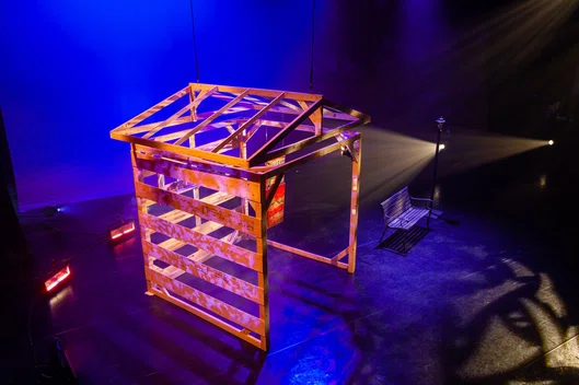 Wood structure on stage with spot lights illuminat